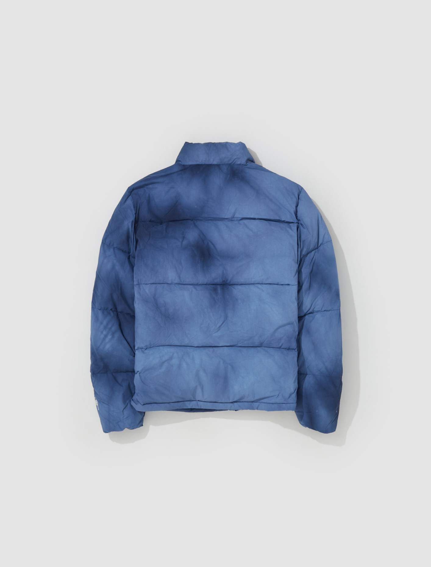 Stüssy Recycled Nylon Down Puffer Jacket in Washed Navy | Voo Store Berlin  | Worldwide Shipping