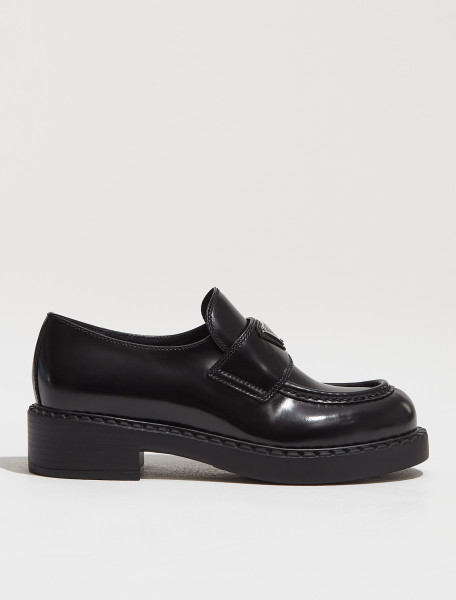1D246M_ULS_F0002 PRADA BRUSHED LEATHER LOAFERS IN BLACK