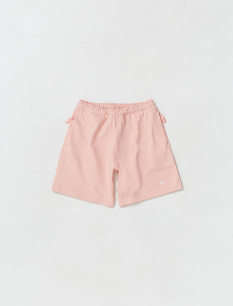 NIKE   NRG SOLO SWOOSH FLEECE SHORTS IN BLEACHED CORAL   DV3055 697