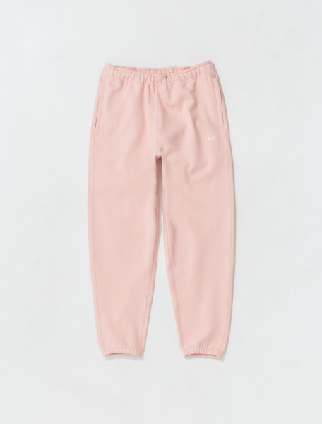 NIKE   NRG SOLO SWOOSH FLEECE PANTS IN BLEACHED CORAL   CW5460 697