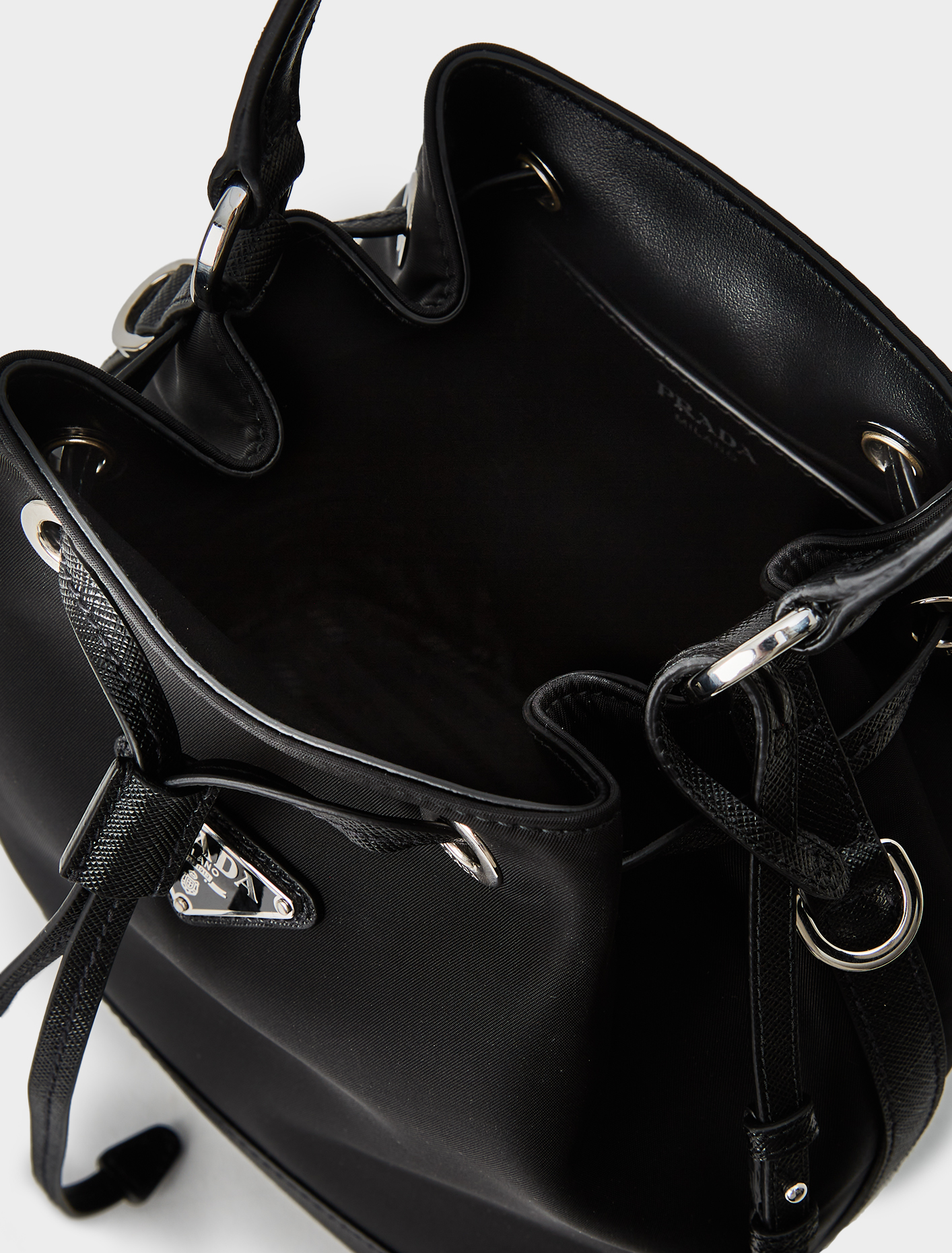 Prada Nylon Bucket Bag with Leather Trim in Black | Voo Store Berlin ...
