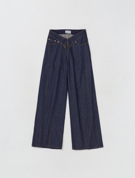 JEAN PAUL GAULTIER   LOW WAISTED FLARED JEANS WITH LOGO DETAIL IN INDIGO   22 06 F JE001L D001 55 INDIGO