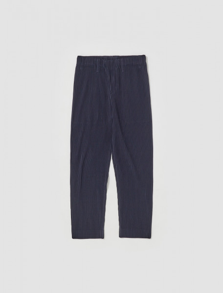 HOMME PLISSÉ ISSEY MIYAKE   PLEATED TROUSERS IN NAVY   HP28JF15075
